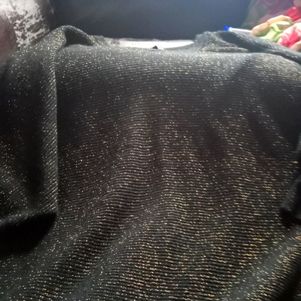 Oldie woman's sparkling shirt